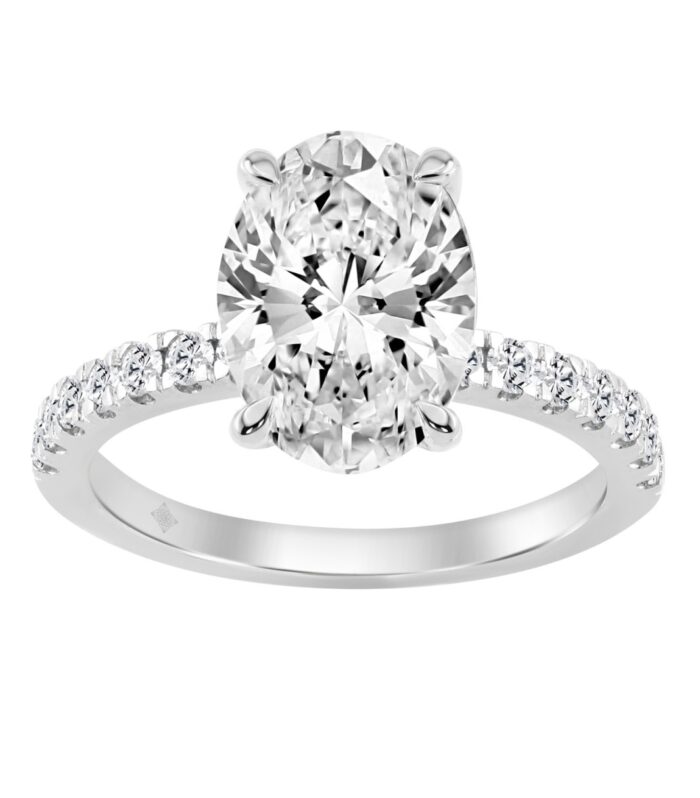 14K WHITE GOLD 3 1/2CT ROUND/OVAL DIAMOND LADIES RING (CENTER STONE OVAL DIAMOND 3CT)