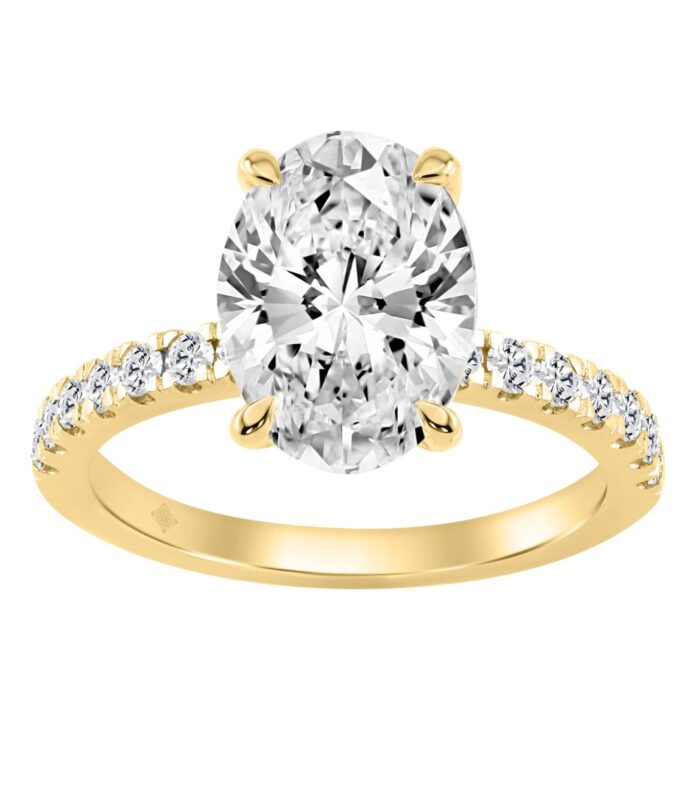 14K YELLOW GOLD 3 1/2CT ROUND/OVAL DIAMOND LADIES RING (CENTER STONE OVAL DIAMOND 3CT)